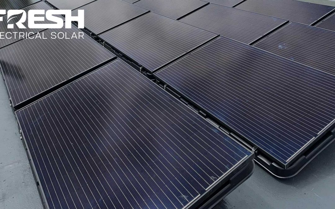 All Black Solar Panel Installation on a flat roof on tubs